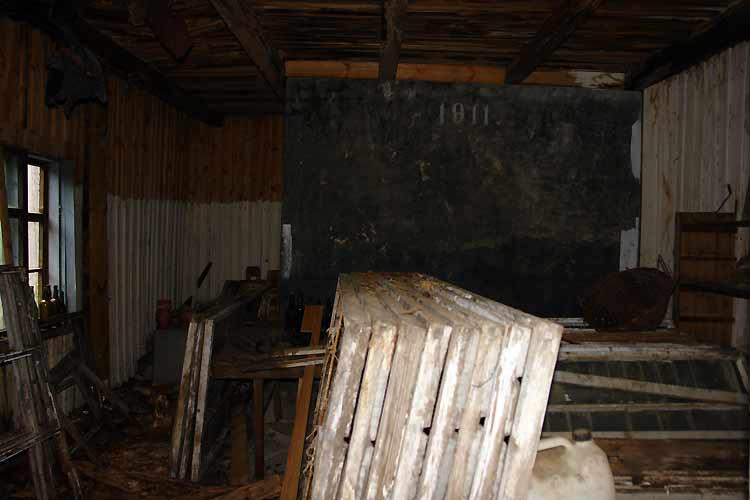 The glass panels of the last greenhouses were stored in the water house; this is where we found them.